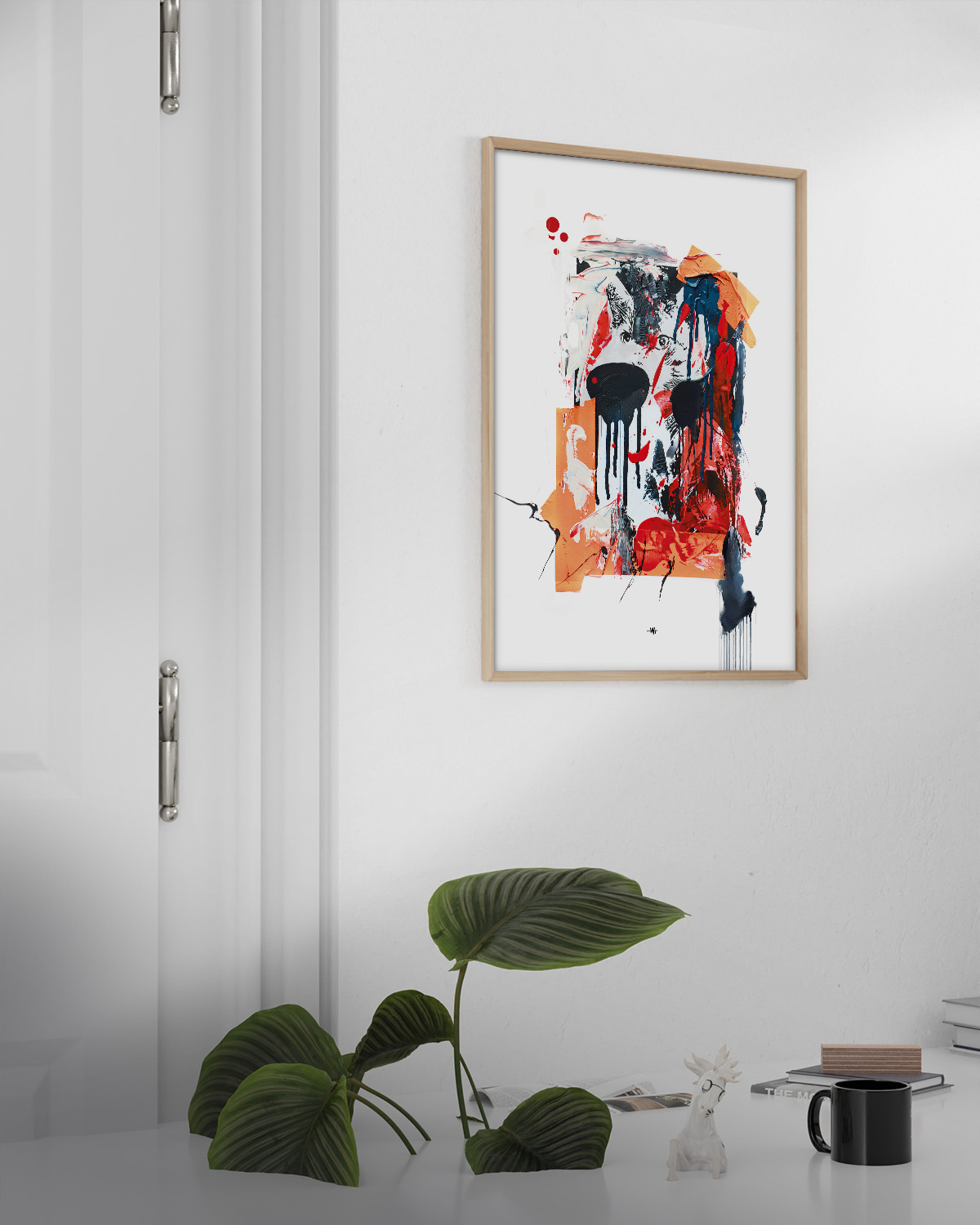 gerahmter Kunstdruck in kräftigen neon orange und rot-tönen, der von schwarzen akzenten durchbrochen wird.
